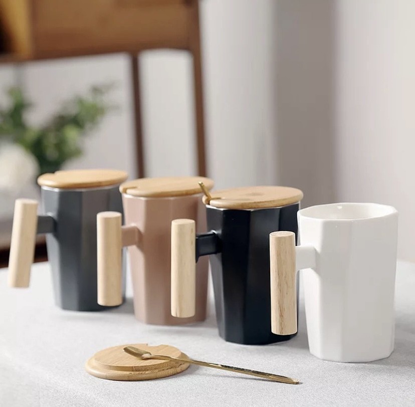 Ceramic mug with wooden lid and spoon